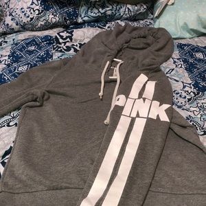 A v-neck pink hoodie